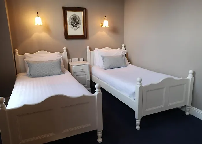 بيت ضيافة O'neills Victorian Pub & Townhouse