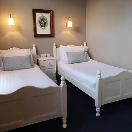 بيت ضيافة O'neills Victorian Pub & Townhouse